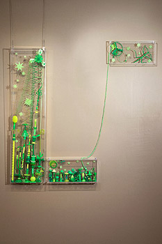 Title: Fais le lien - Recycled plastic and found object sculptures by Diana Boulay - made of discarded plastic objects - Colorful art that makes you reflect upon society's waste mismanagement